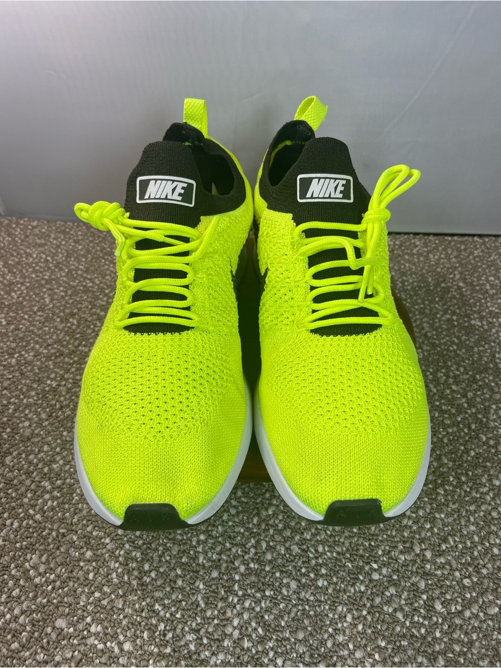 Nike Air Zoom Flyknit Racer Sneakers Mariah in a Bright Volt Yellow Color.